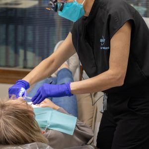 Happy customer getting dentures same day